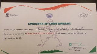 Swaccha Hotel Award by the Mysuru City Corporation towards a cleaner and greener city.